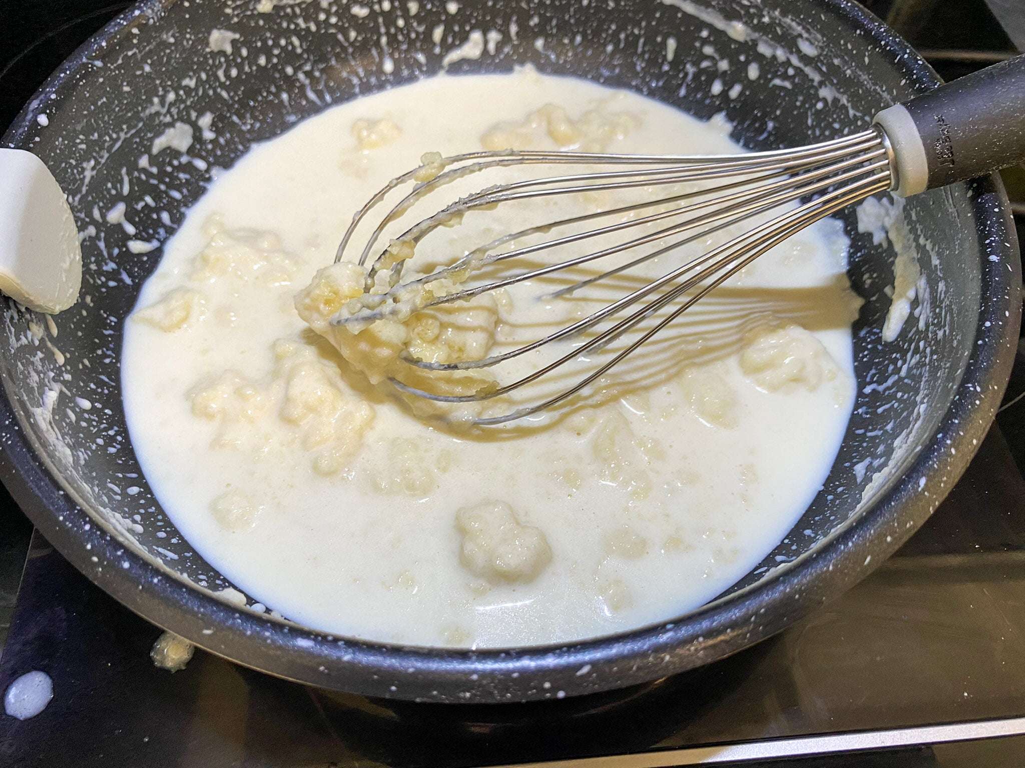 hello-fresh-cream-sauce-base-Step 03.03.Whisk in the Milk